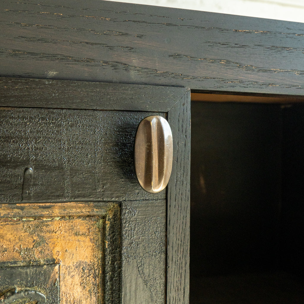 carved oak credenza detail view