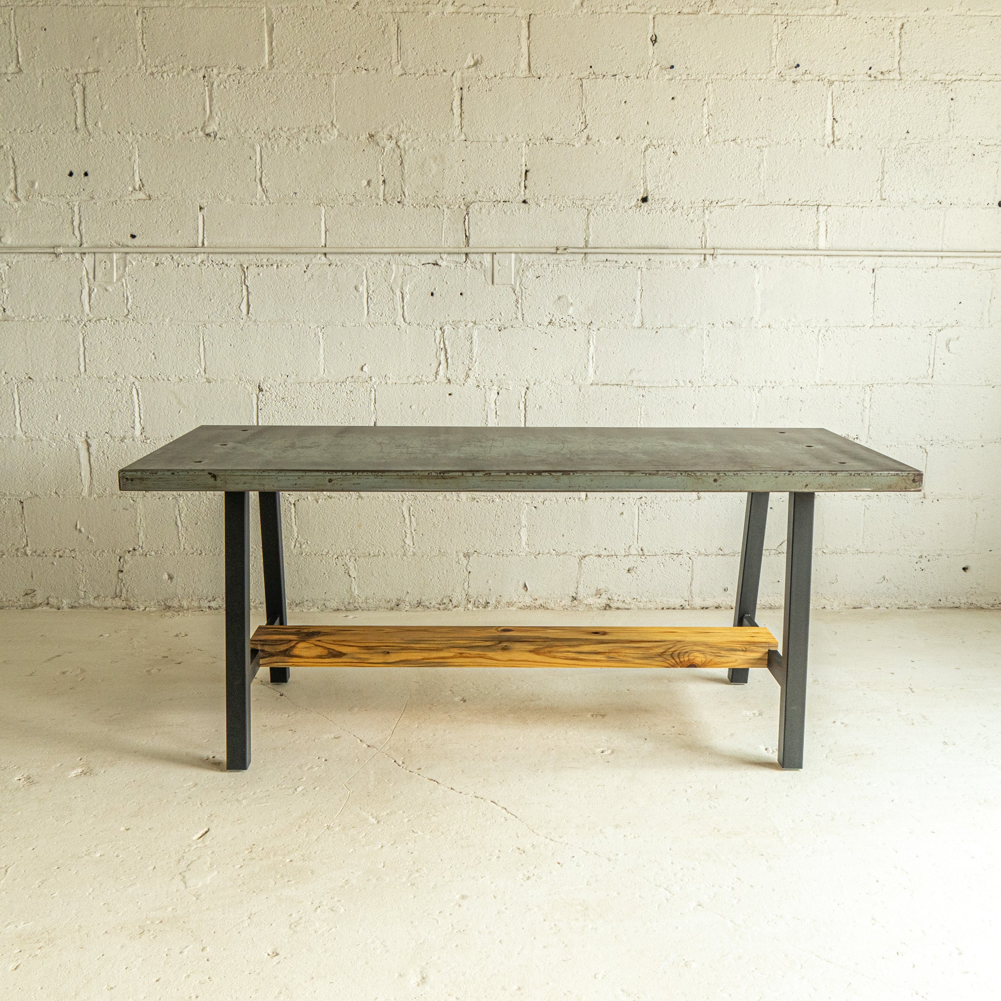 Metal dining table full view reclaimed wood